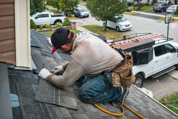 Professional Roofing technician working in Kensington, CA